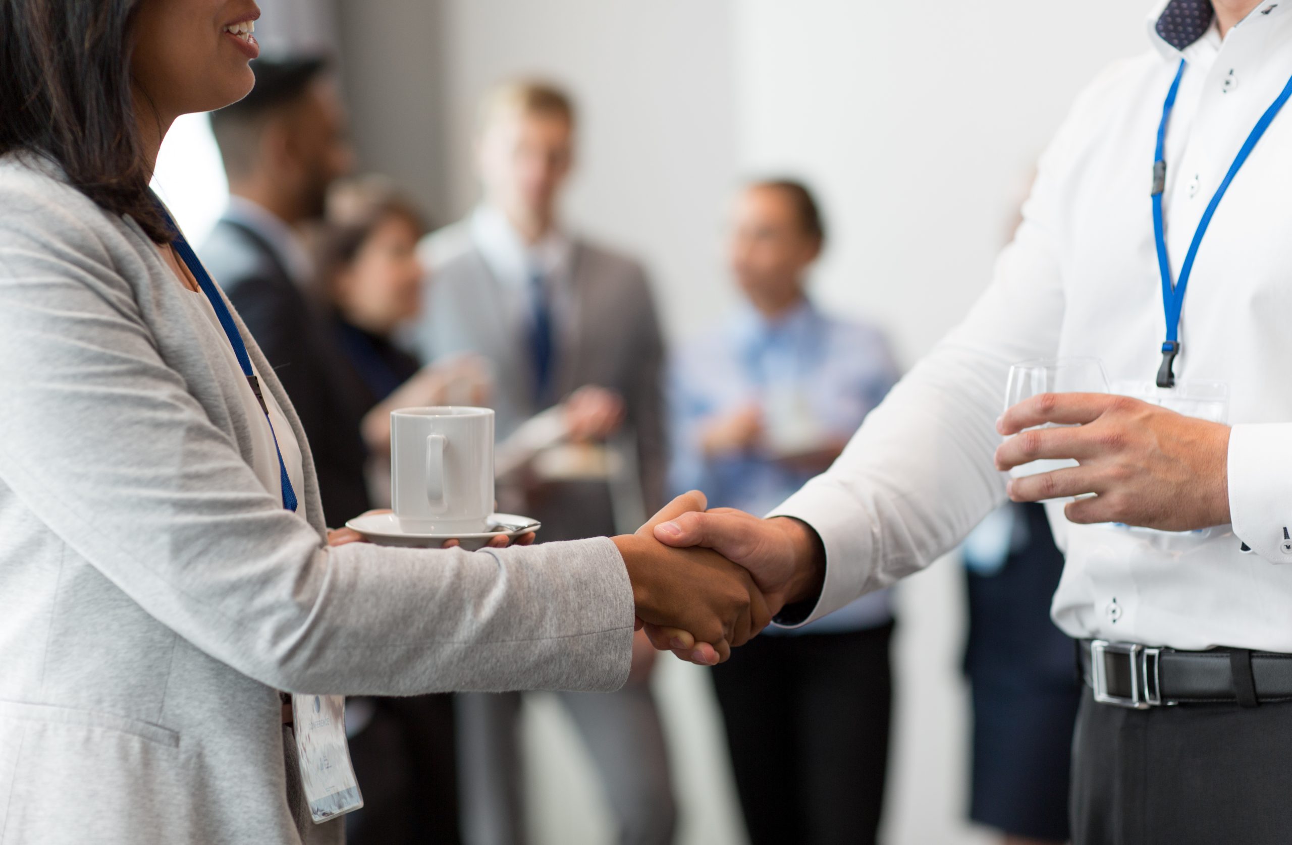 handshake of people at business conference